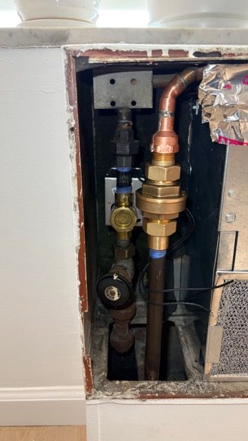 Copper pipes and brass valves.